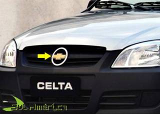 Foto do Produto: EMBLEMA GRADE CELTA 2007 PRISMA 2006 CROMADO GRAVATA DOURADA