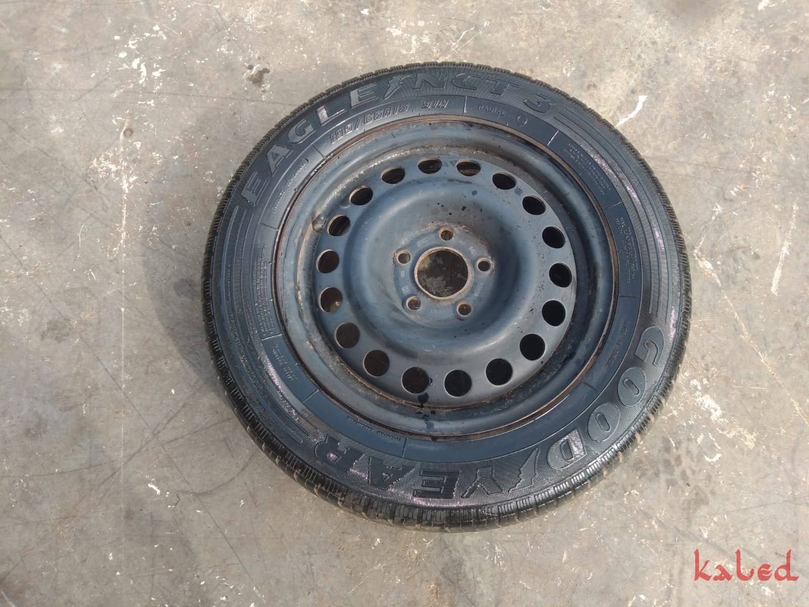 Roda de ferro aro 15 c/pneu meia vida  - Kaled Auto Parts